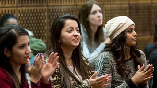 Students from the BAME community clap