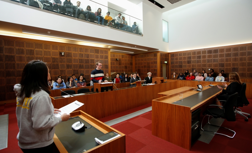 students in the mock court room practicing court proceedings 