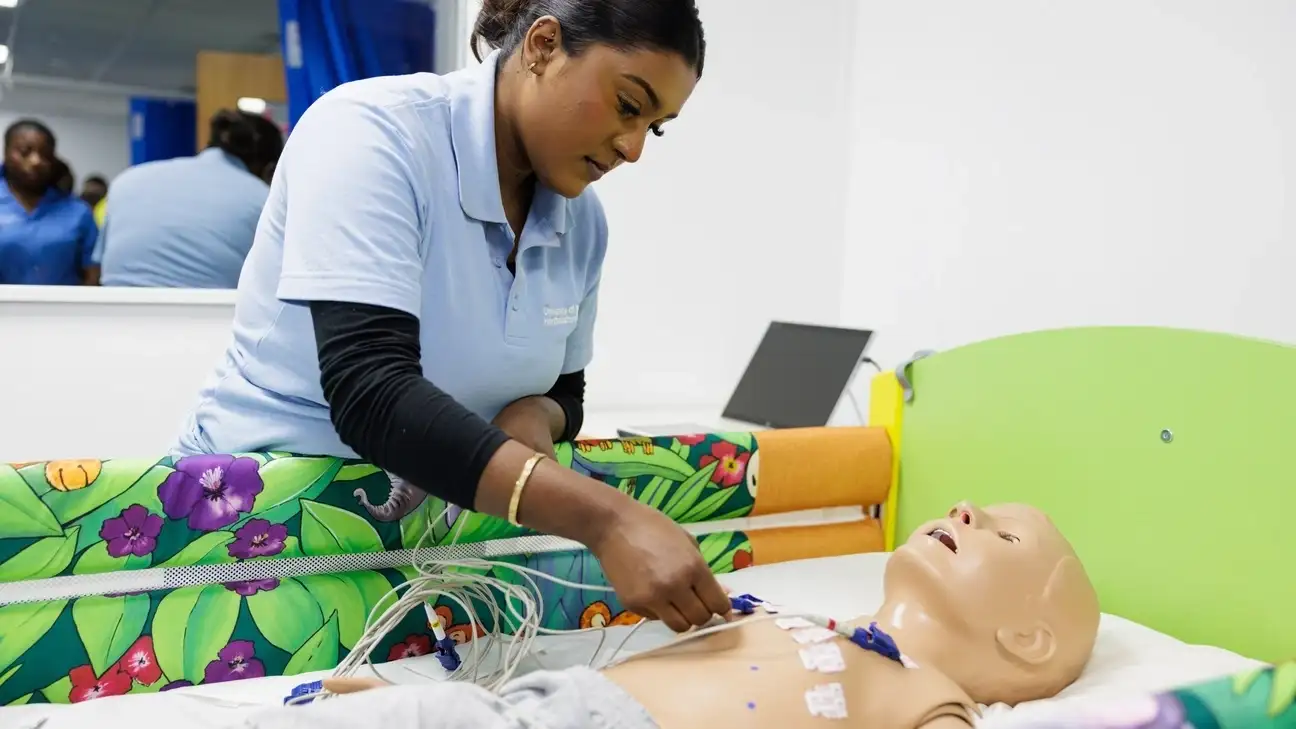 Nursing students working on dummy 