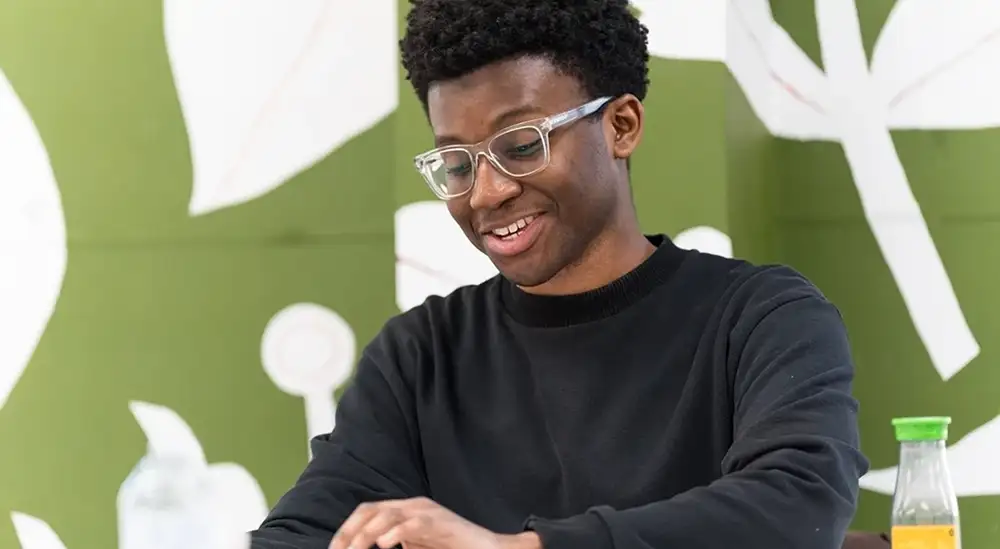 A student smiling