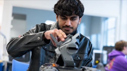 student in robotics lab 