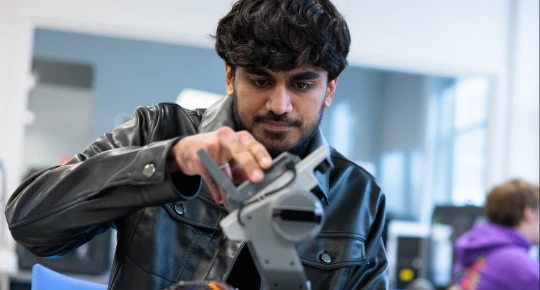 Student working in robotics lab 