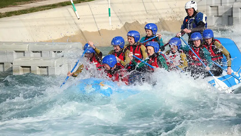 People white water rafting