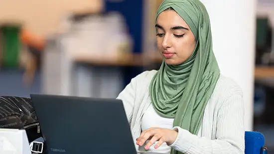 Person working on a laptop