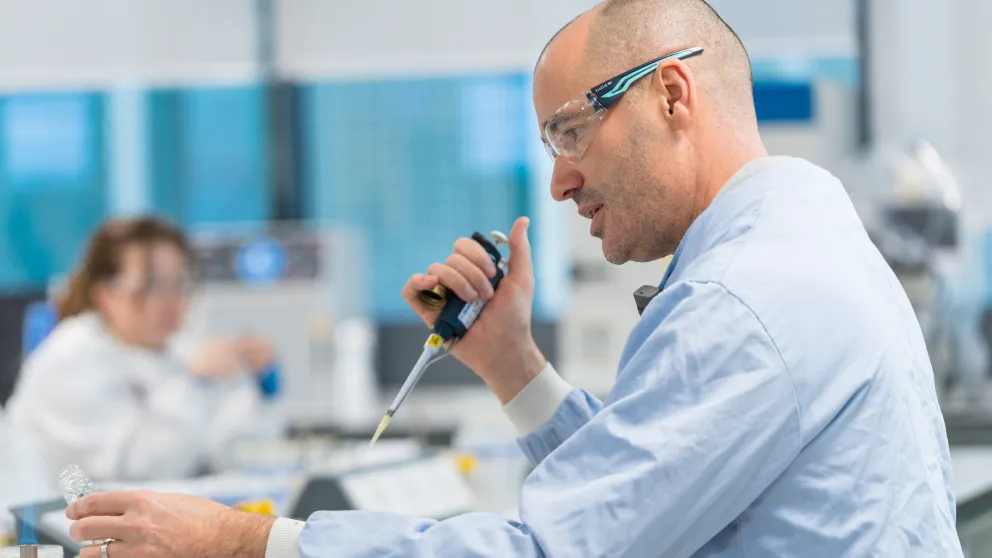 Student with a pipette