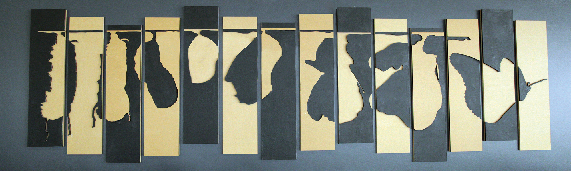 Stages of a butterfly in black and white wood