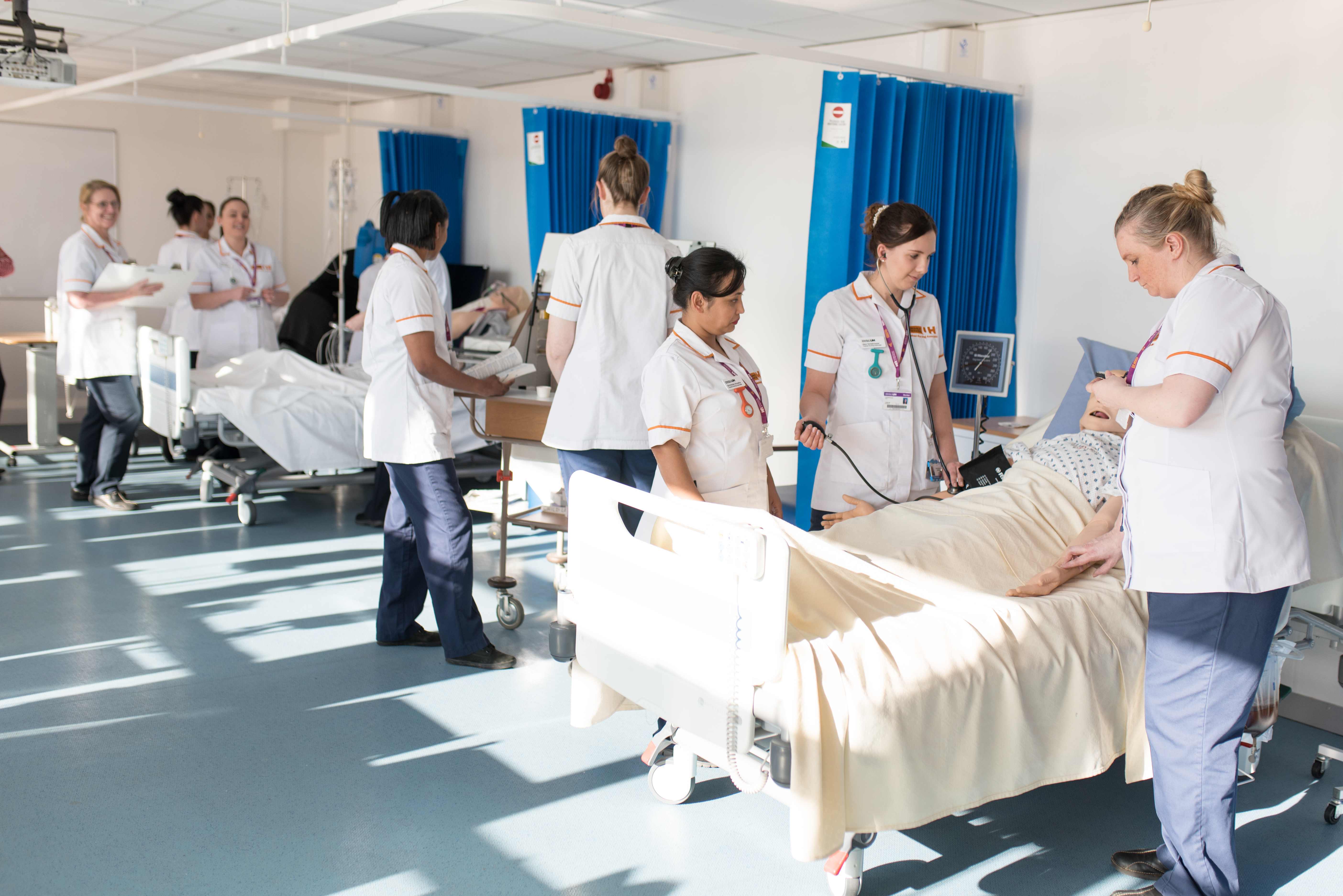 Nursing associates in training in a ward