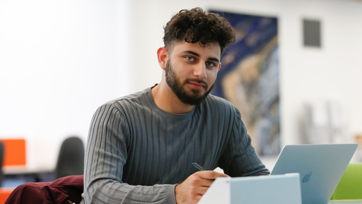 Males student at a desk