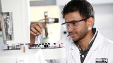 Male pharmacy student in the lab