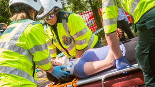 Paramedics working on pod