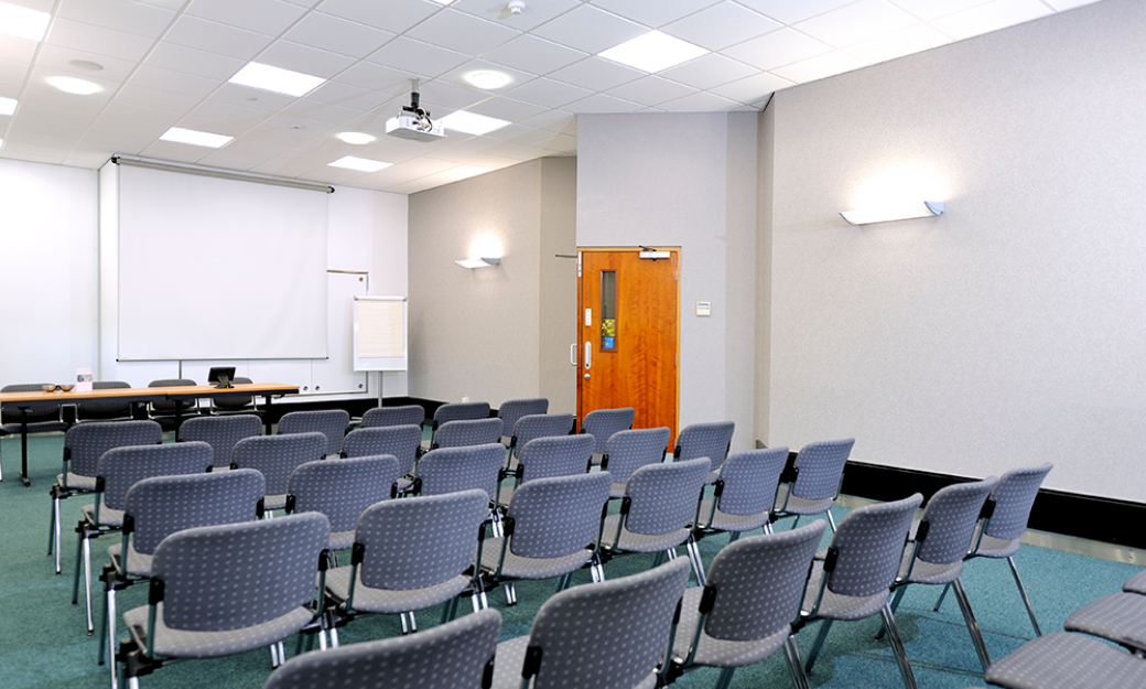 Meeting room with rows of chairs