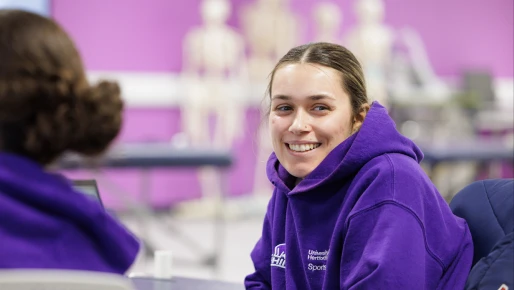 A female student smiling