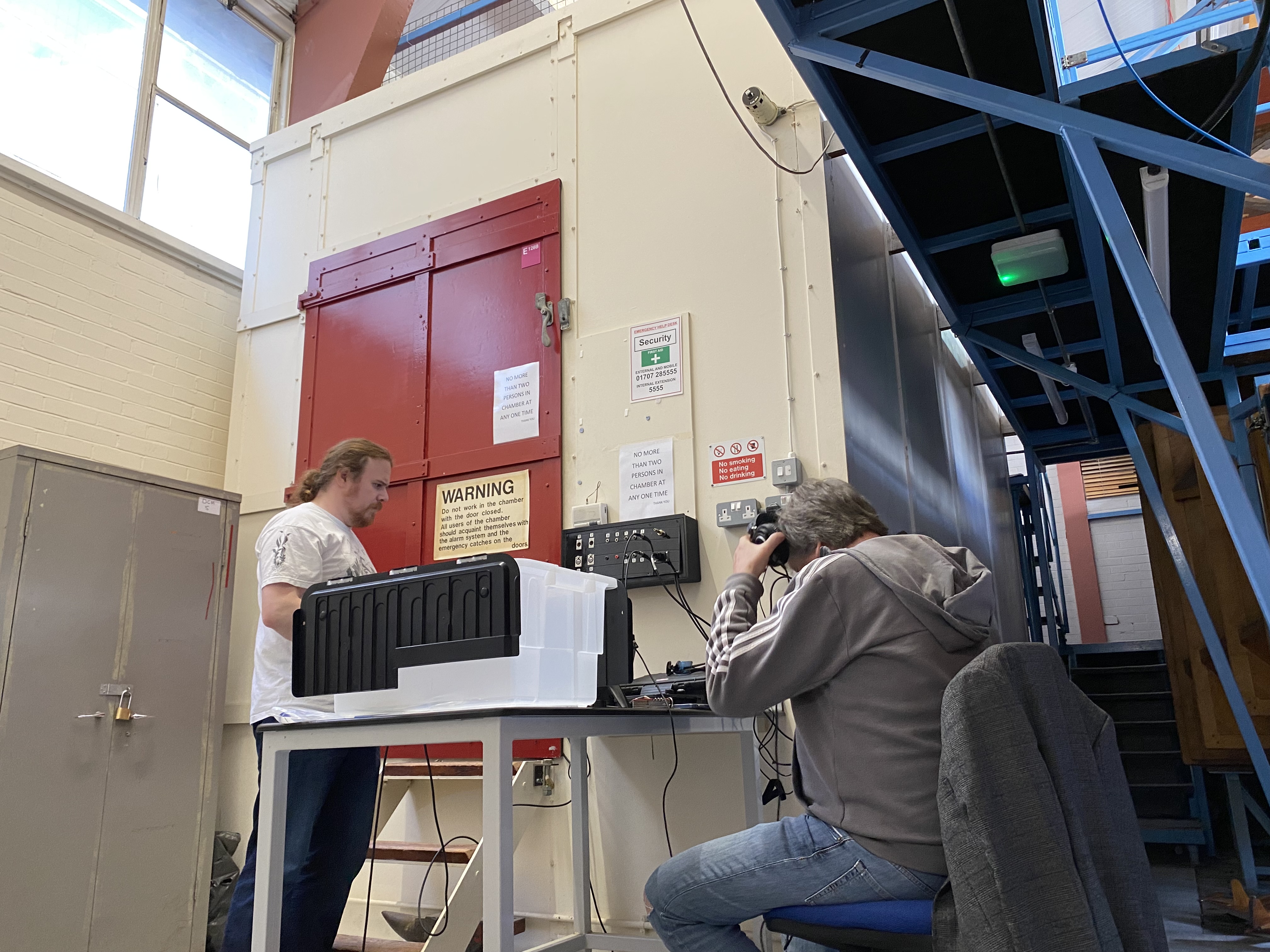Two people in a lab working