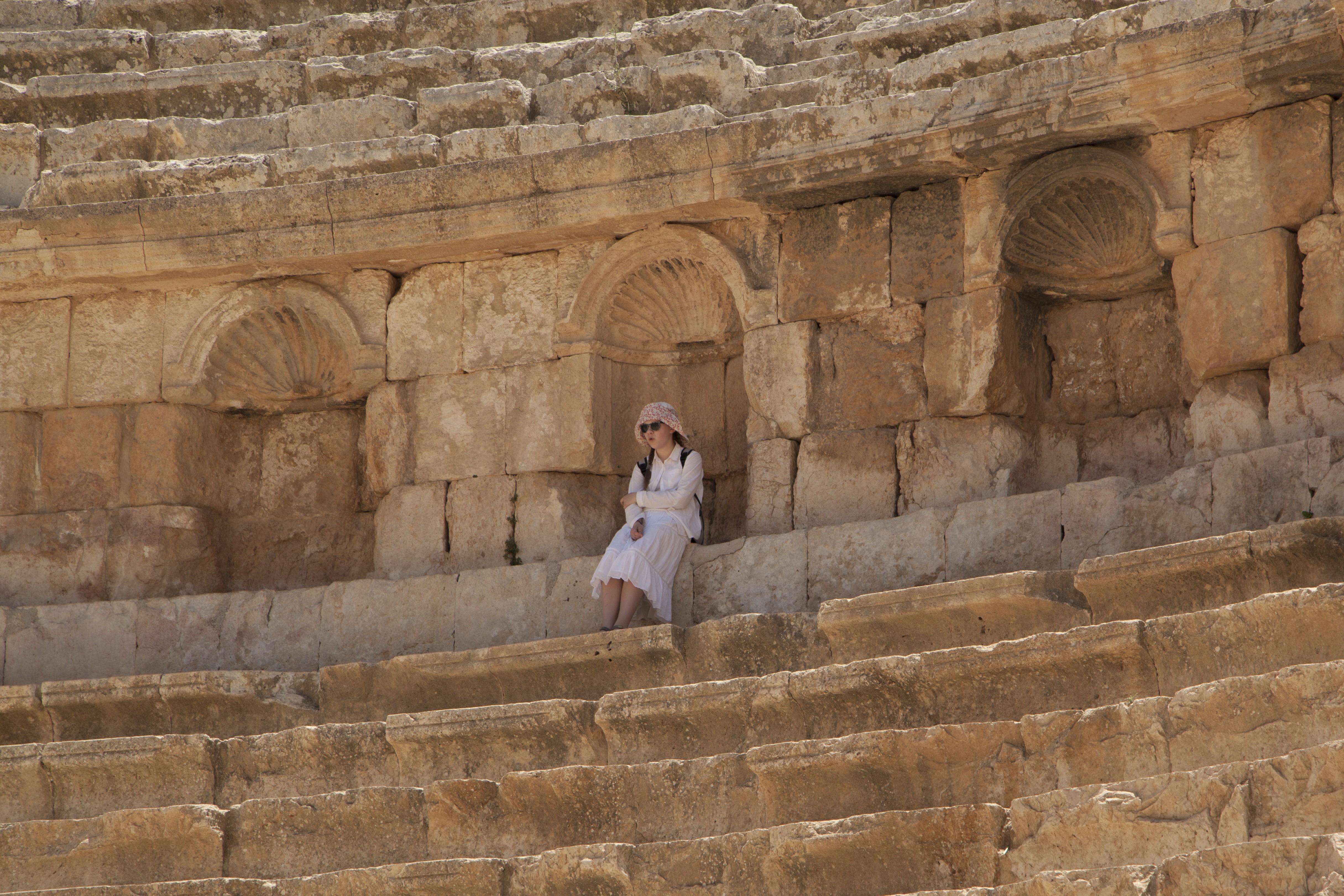 A person sitting on Amphitheatre steps