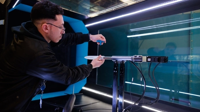 A student using the wind tunnel for aerodynamics