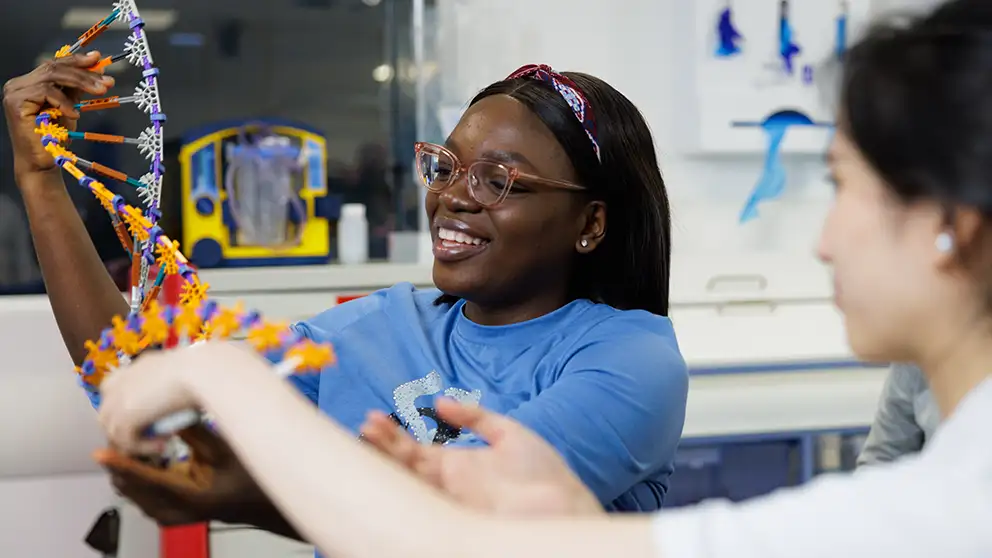 A student using medical equipment