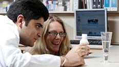 pharmacy students working at a desk