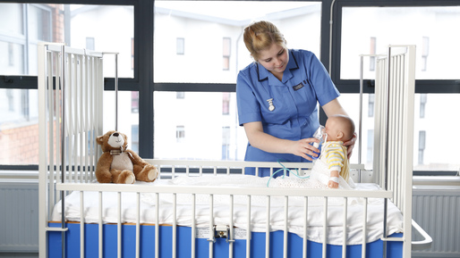 Nursing student practising in a ward