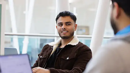 Student sitting in a chair