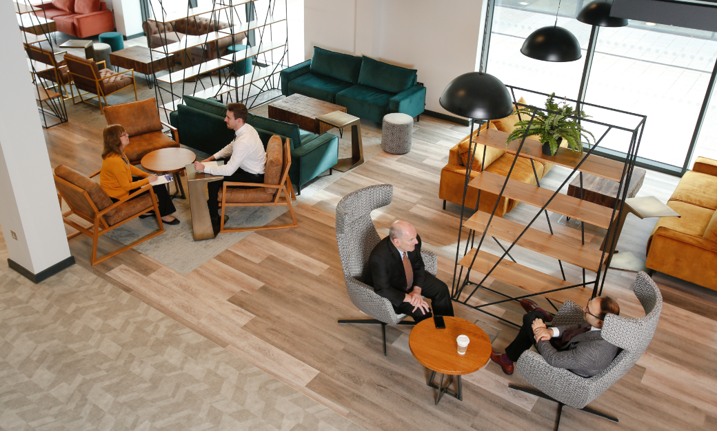 Business men and women in cafe area