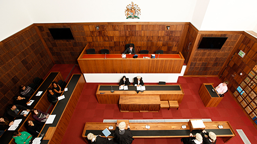 Birds eye view of a mock trial taking place in our replica law court 