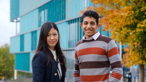 two students confidently looking into the camera