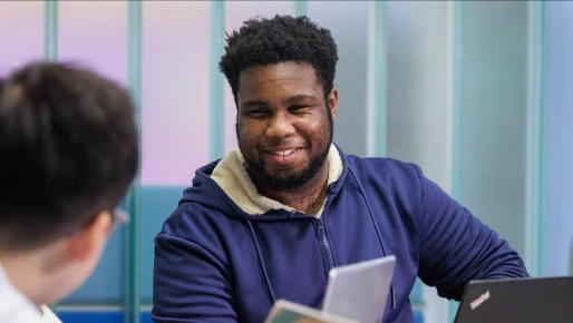 A male student smiling