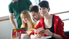 Female student reading book