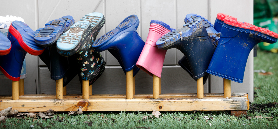 A row of childrens' wellington boots