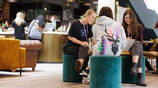 Students relaxing in cafe