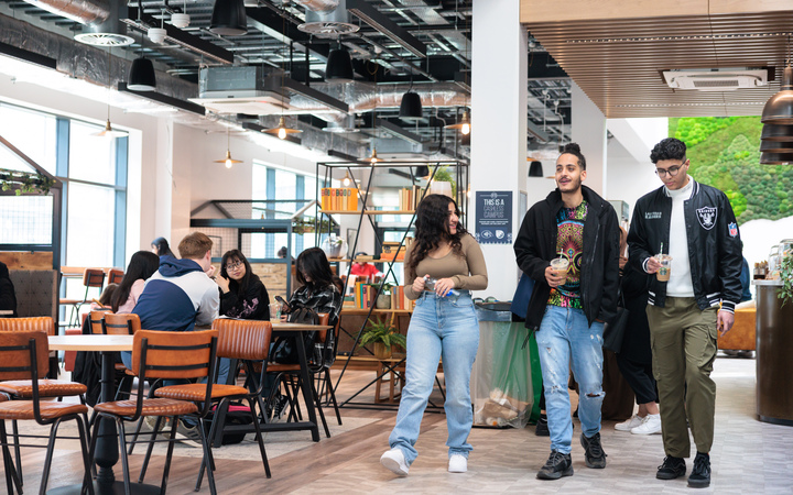 Students talking in the Enterprise Hub