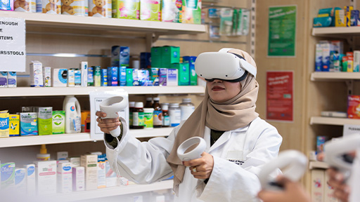 Female student wearing virtual reality headset