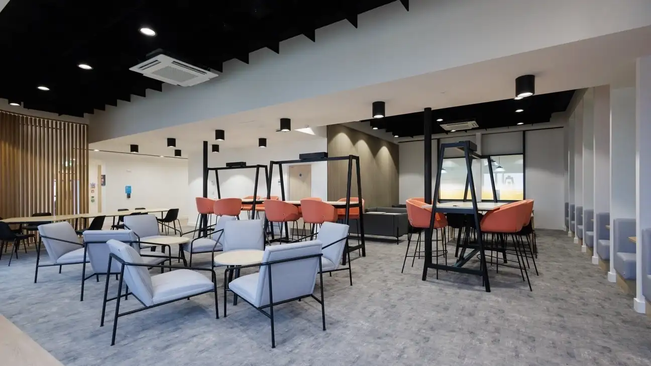 Room with chairs and tables in