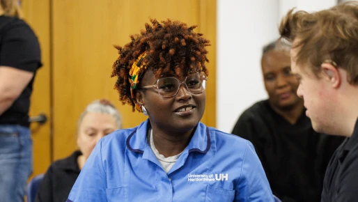A student smiling