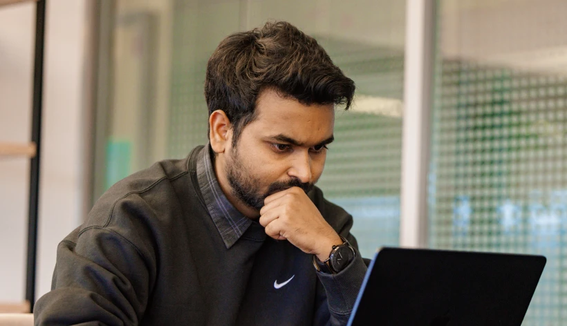 Person looking at laptop 