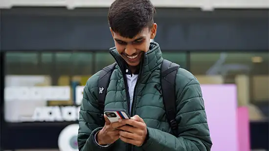 Student looking at phone