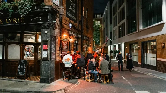 Image of a street with a pub on the corner